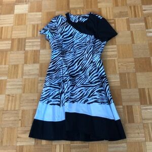 Donna karen New York dress with shoulder cut out detail. Worn once. Size 12